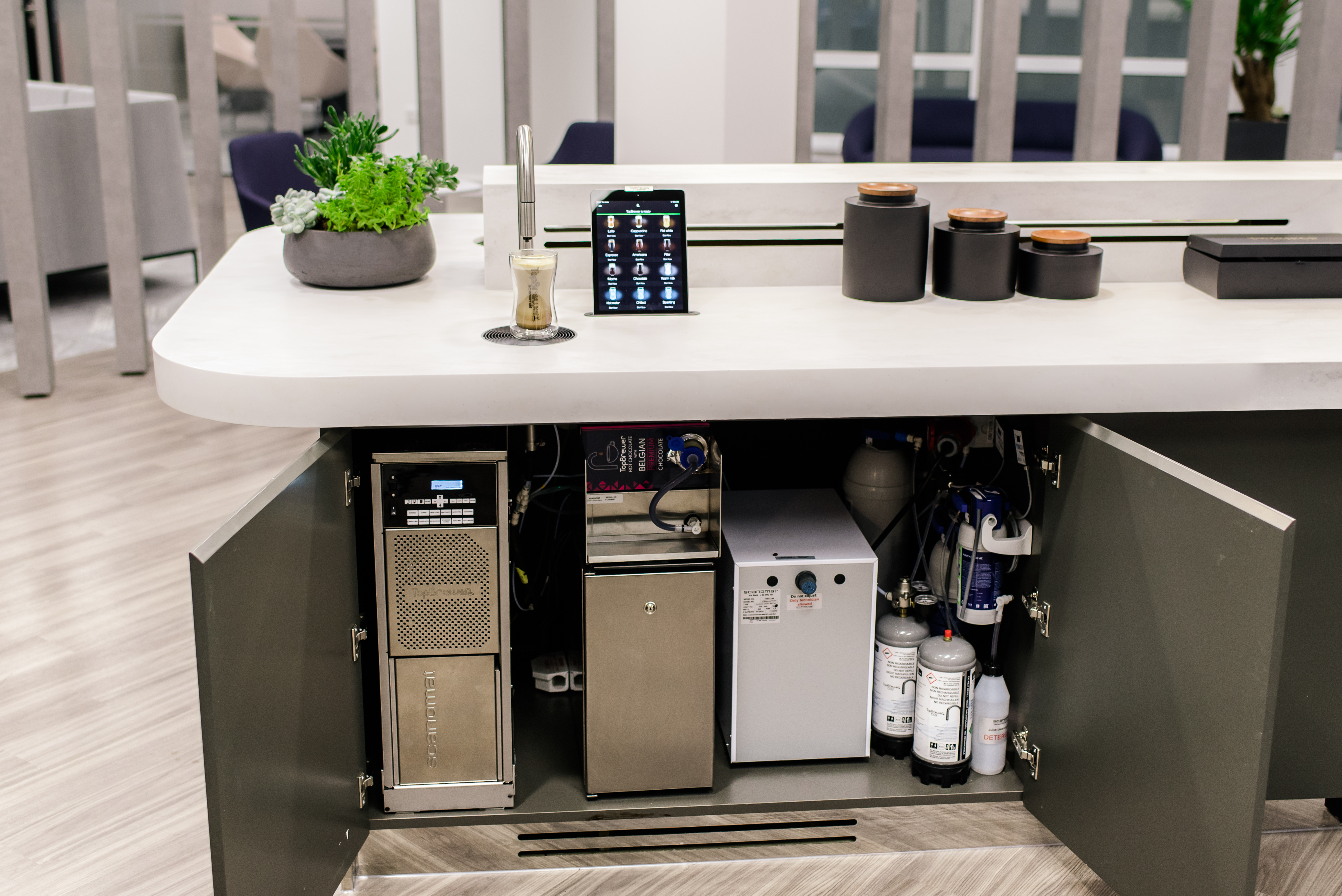 AmTrust TopBrewer showing under cabinet